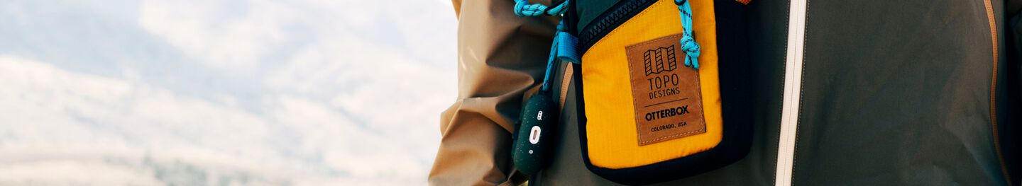 OtterBox x Topo Designs branded canvas shoulder bag and AirPods case