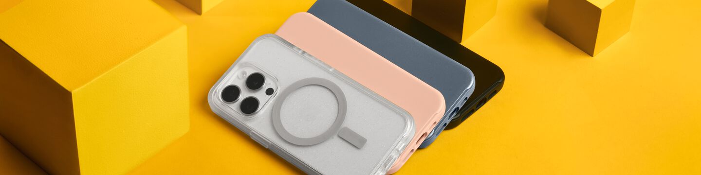 Variety of clear and solid colored OtterBox iPhone 15 Pro cases on a yellow background