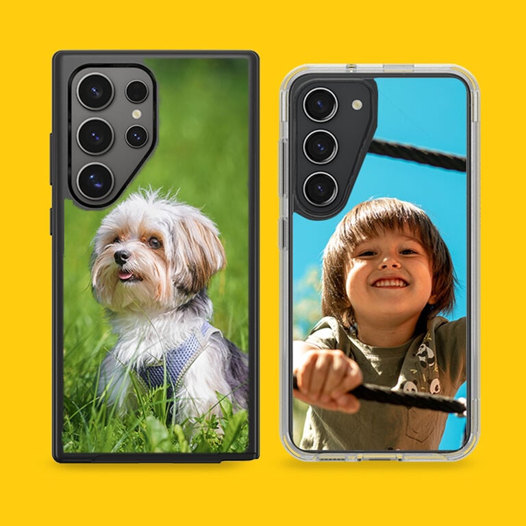 Two phone cases, one with a dog on grass and the other with a child, on a yellow background.
