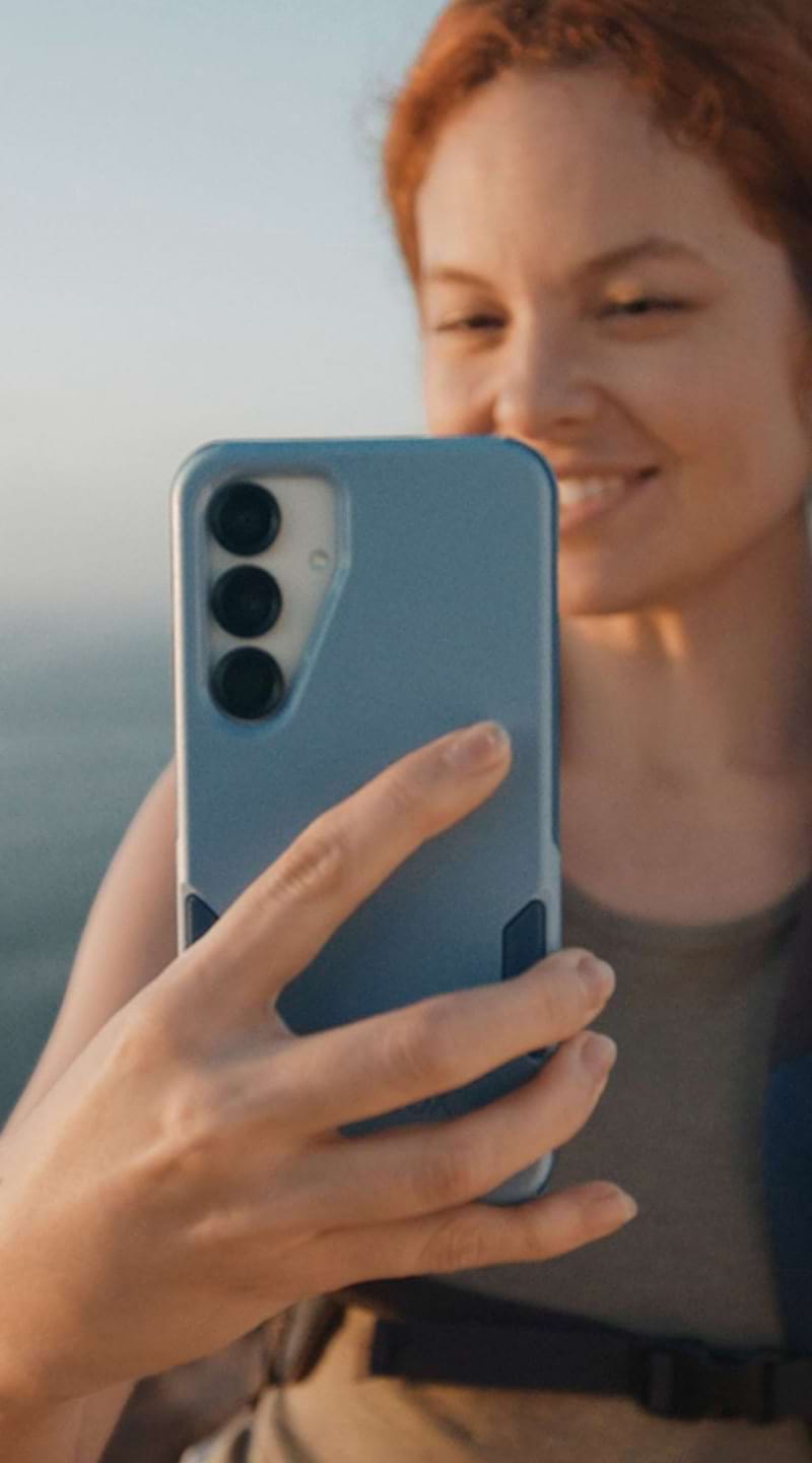 woman holding blue otterbox commuter series for samsung galaxy