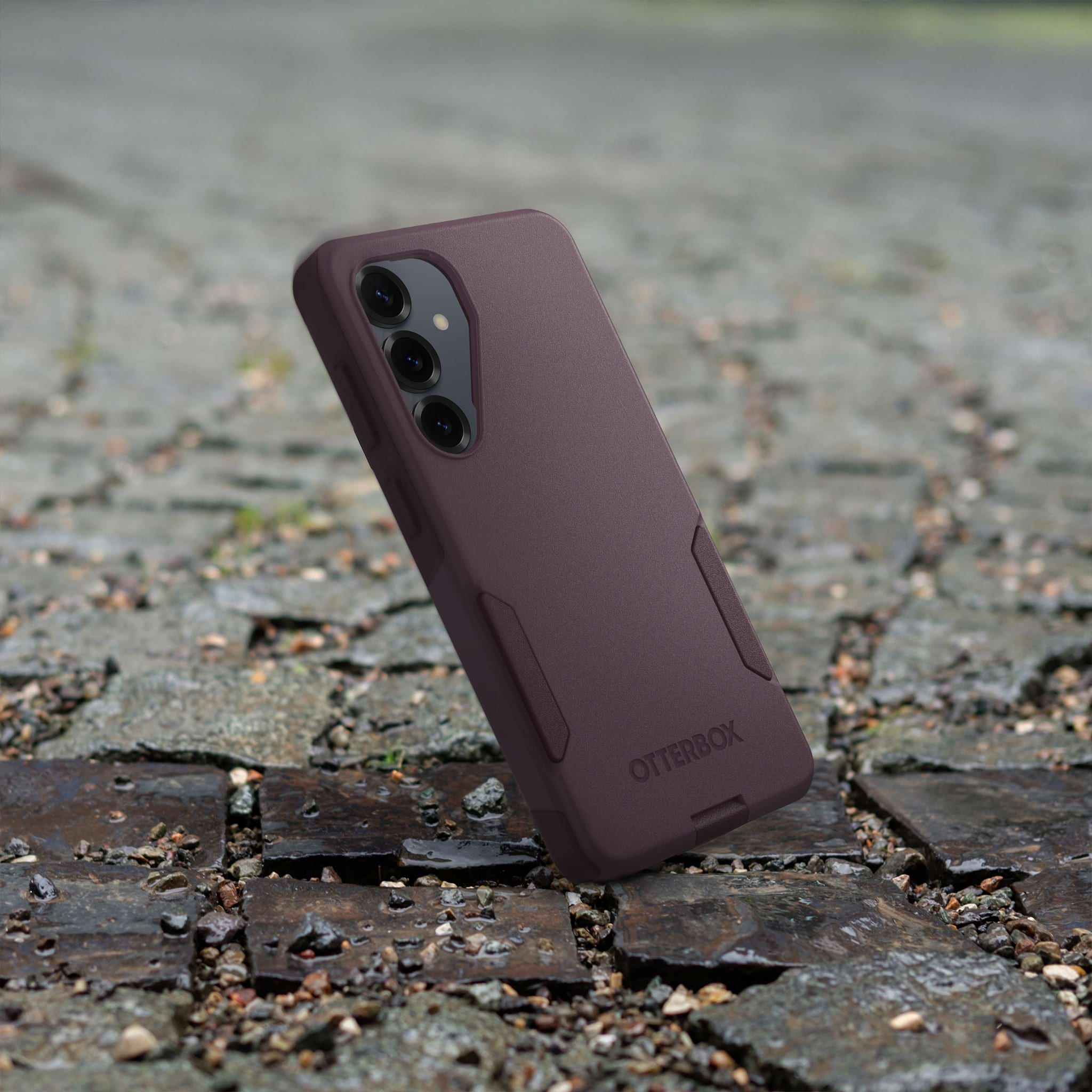 Samsung Galaxy in a maroon OtterBox Commuter Series phone case