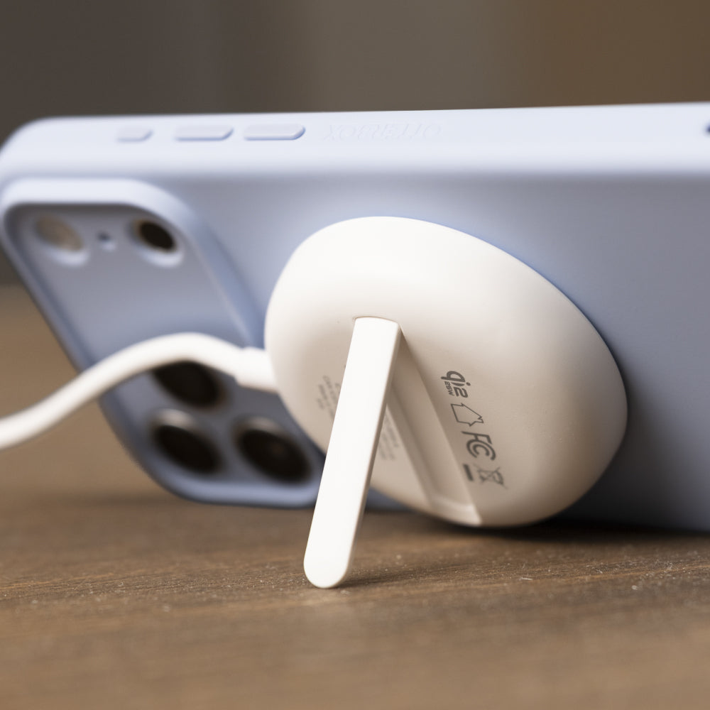 otterbox case using a wireless charger as a stand