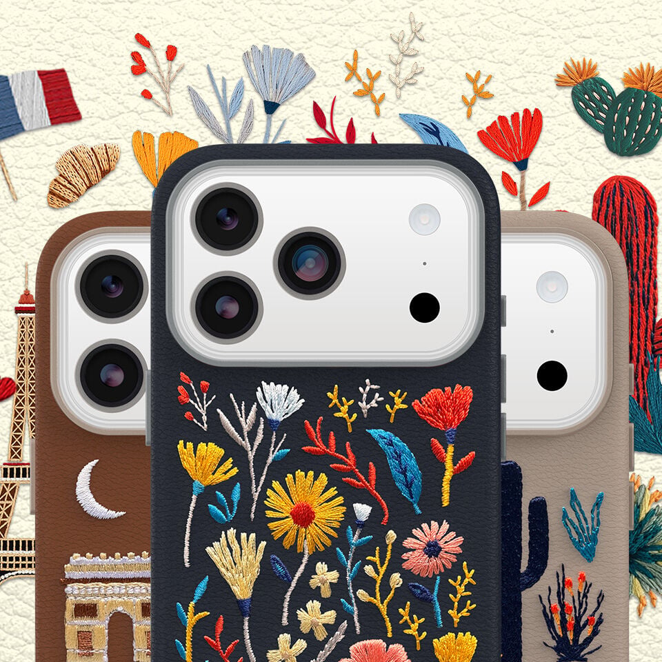 Phone case with floral embroidery design on a decorative background