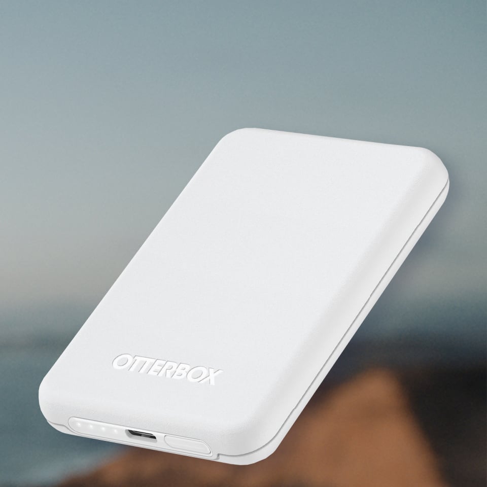 White OtterBox device on a blurred background