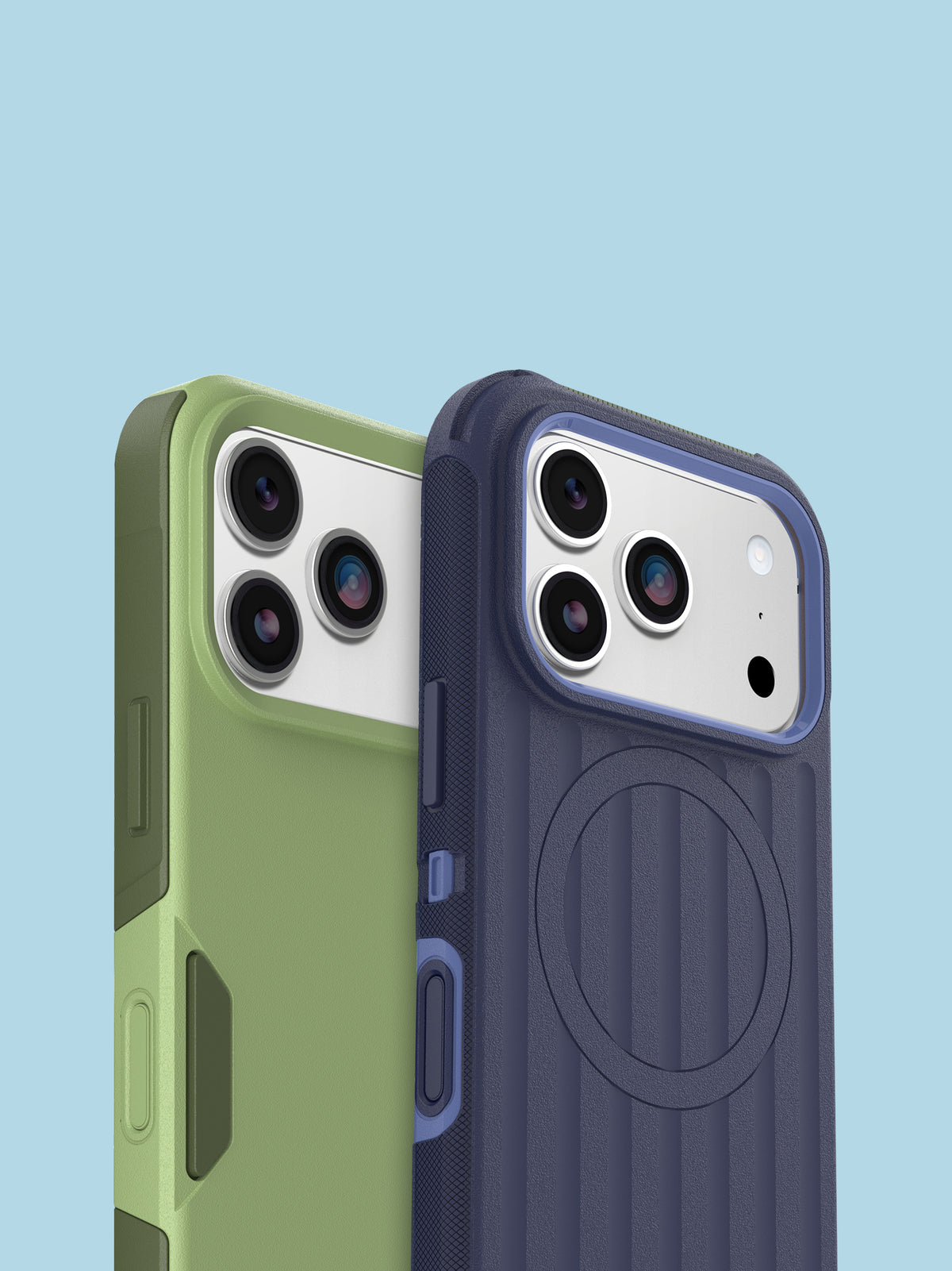Two protective phone cases shown from the back on a light blue background. The left case is light olive green, and the right case is dark navy blue with a lighter blue border around the camera cutout.