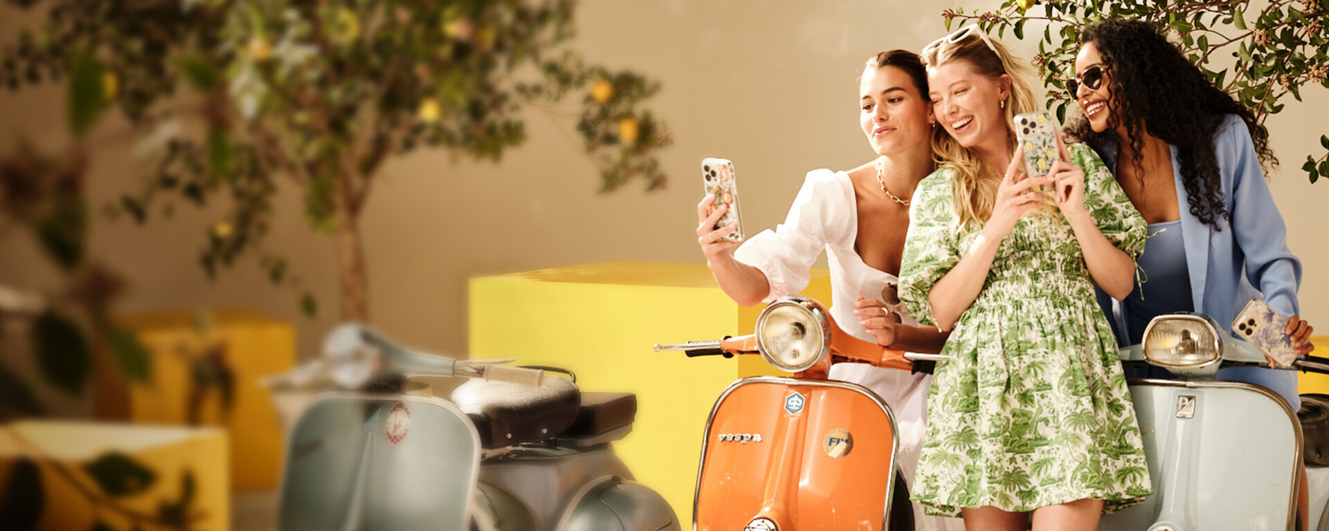  Girls holding cute phone cases on vespas summer vibes| OtterBox