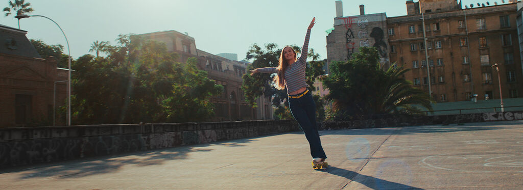 woman holding a bright green iphone case | OtterBox